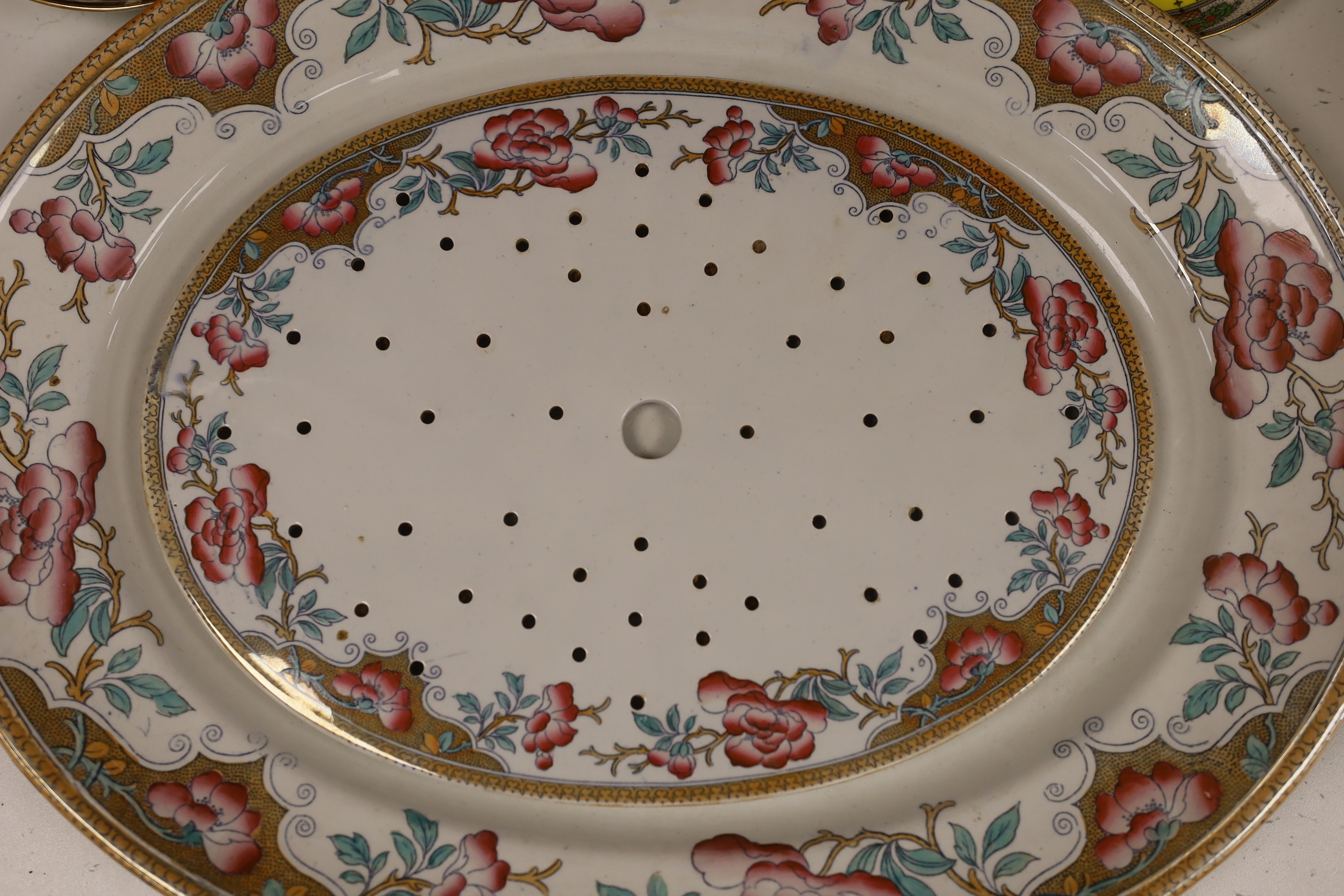 A Victorian stone china oval meat platter, a Derby cup and saucer, two others and two Spode ‘Italian’ plates, platter 50cm wide